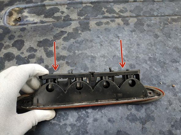 
present the plate on the fire and press to lock
