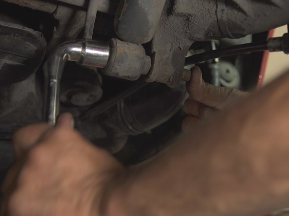 
Once the pressure is released, pull the screw to remove it
