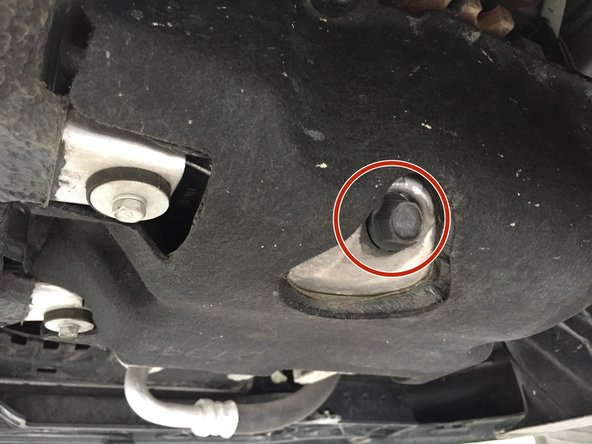 
Place a tray under the vehicle
