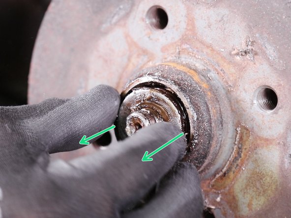 Retirez la  rondelle avec vos doigts