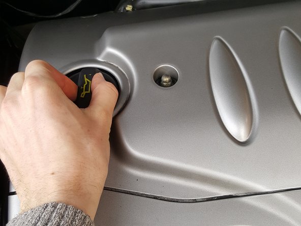 
Unscrew and remove the oil filler cap
