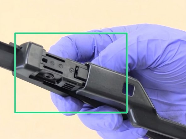 Clipser le balai sur le bras