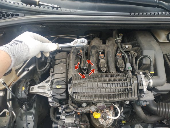 dévisser la vis de fixation de la bobine, clé de 8mm