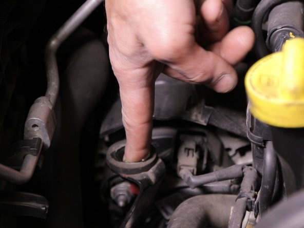 Graisser les attaches de la boite à air