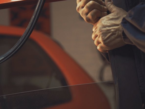 
Hold the glass with one hand or another person, while pulling out the seal the glass will come free
