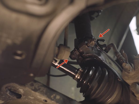 Resserrer la vis et l'écrou à l'aide de la clé à pipe de 18 et la douille XZN M14