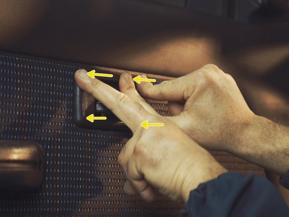 
The thicker side towards the armrest
