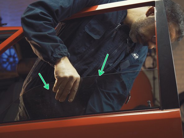 
Hold the top of the window with one hand
