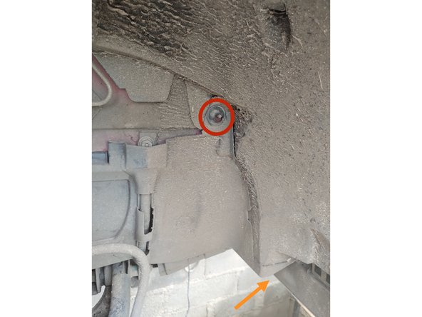 Reposer le cache courroie et visser l'écrou