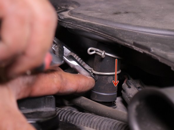 A l'aide de la pince multiprise descendez le collier du manchon pour le bloquer