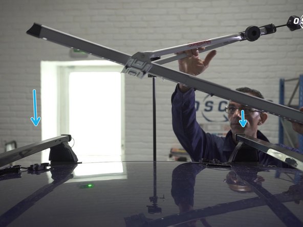 Positionner le porte vélos sur vos barres de toit