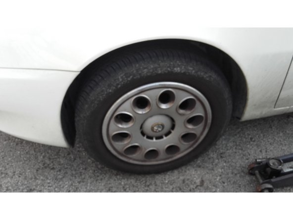 Remise en place de l'enjoliveur