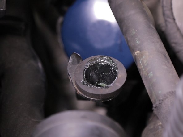 Graisser les attaches de la boite à air