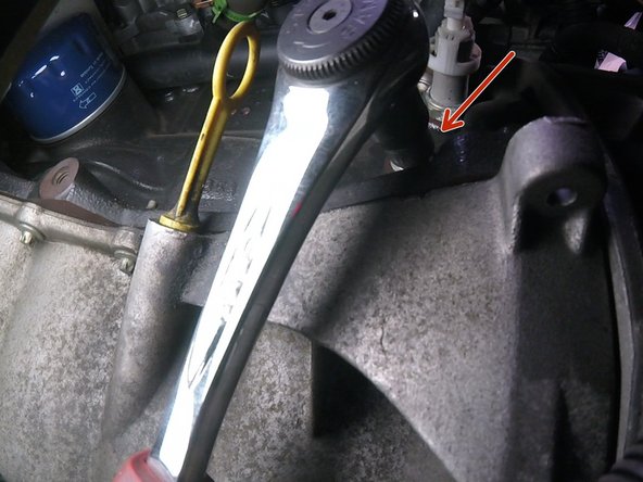 Retirer le bouchon de la pige du  vilebrequin afin d’insérer la pige avec une douille Torx E14