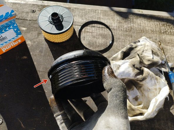 mettre le joint torique en place et y appliquer de l'huile