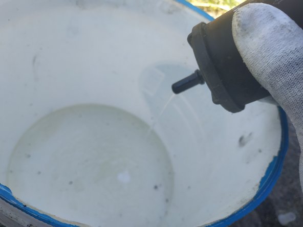 
empty the contents of the filter into the bin (remove the cap if you put one in as I did in the previous step)
