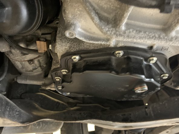 Serrer le à l'aide du carré de vidange