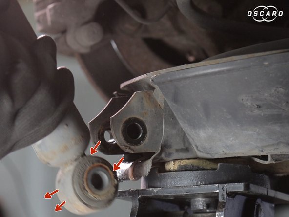 Retirer la vis et sortir l'amortisseur