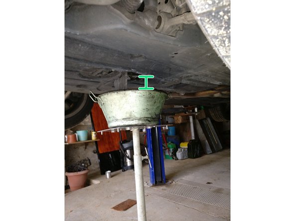 Mettre le récipient sous la vis