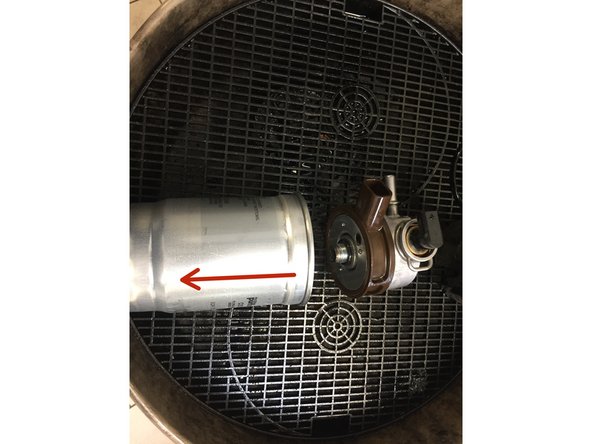 
Unscrew the old filter using the strap wrench
