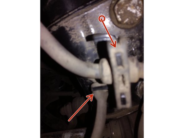 déclipser la durite de frein et le cable de l'abs qui se trouve sur l'amortisseur