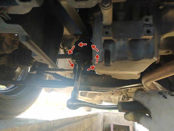 débloquer le filtre à huile à l'aide de la cloche adéquate et de la clé à cliquet