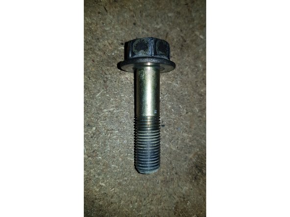 Si la vis n'est pas fournie avec la poulie neuve réutilisez l'ancienne.