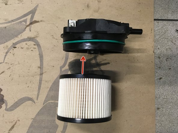 
Fit the new filter by clipping it in place
