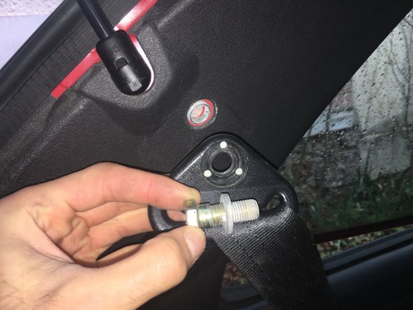 
The screw may be hidden by a plastic cap
