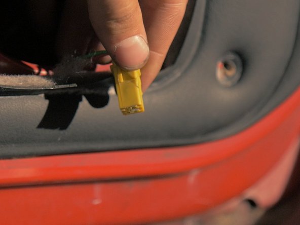 
Pull the connector on the back of the speaker to remove it
