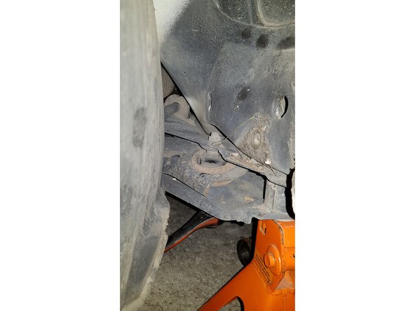 Avec un tournevis cruciforme retirez la vis.