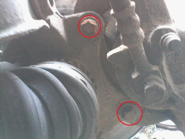 Remonter le support d'étrier puis le serrer avec la clé de force et le tube (couple serrage étrier = 10 daN.m ou 10 m.kg)