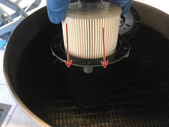 Installer la nouvelle cartouche dans le filtre