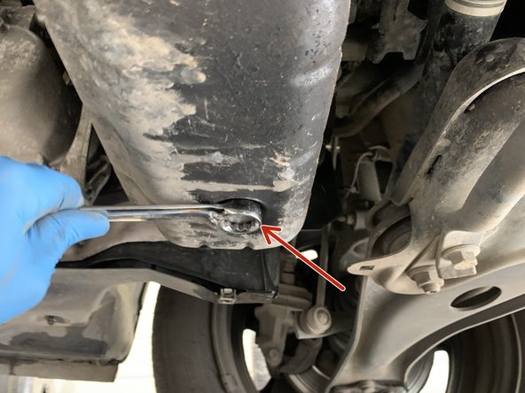 A l'aide de la clé plate de 21 deviser le bouchon de vidange