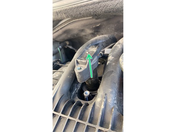 Tirer vers le haut, afin de d'enlever la bobine