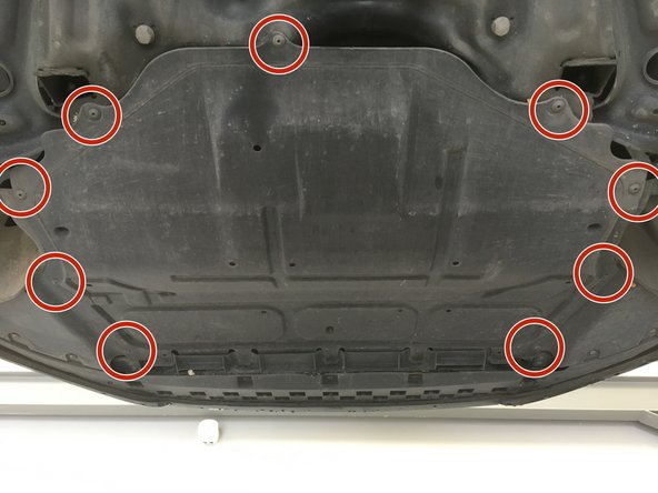 Remonter la plaque sous moteur et visser les 9 vis de T25