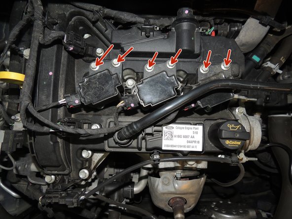 Chaque bobine est maintenue par deux vis.