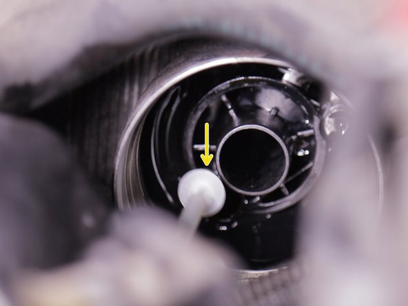 Insérer le guide dans l'emplacement dédié
