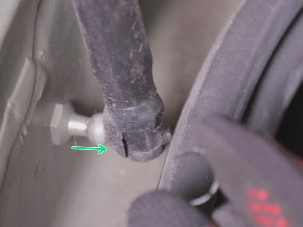 Faire pivoter le clips et tirer vers vous afin de détacher le  vérin