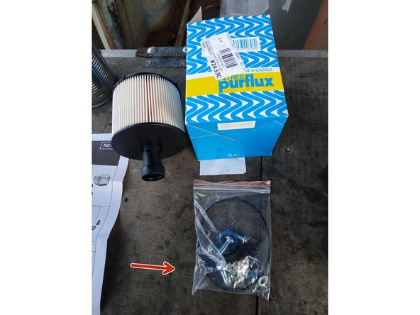 le nouveau filtre est normalement livré avec des vis et des rondelles neuves