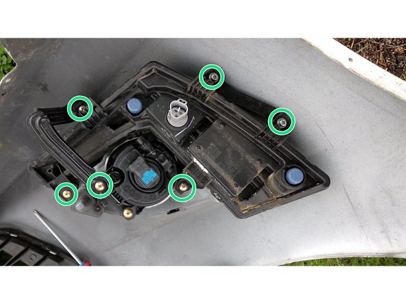 
You have to unscrew the LED daytime running lights to be able to remove the fog light.
