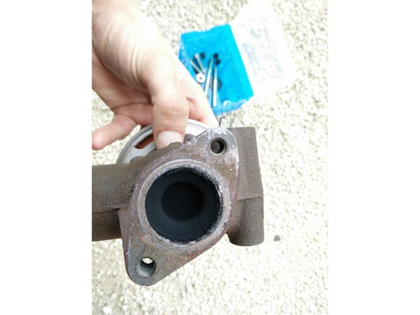 Ne pas mettre de produit sur la tête de la vanne (partie grise)