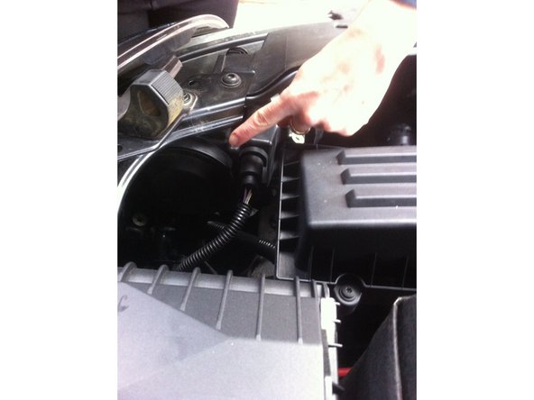 Repositionnez le couvercle sur le bloc de feux.