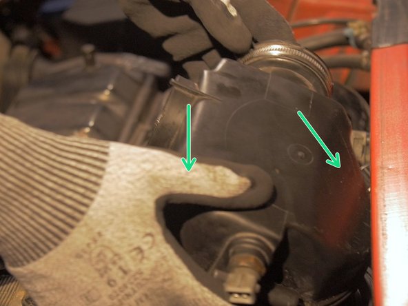 
Replace the air box cover on the filter
