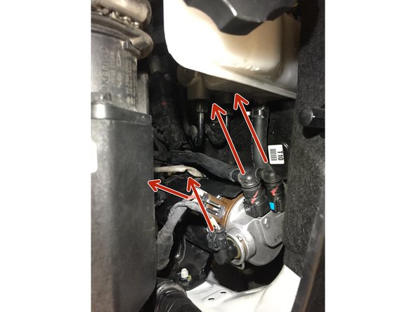 
Disconnect the hoses and the sensor
