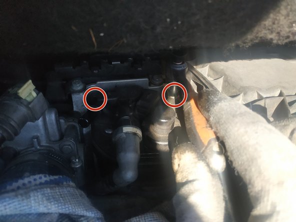 dévisser les 2 vis de fixation du bloc filtre, clé de 8mm