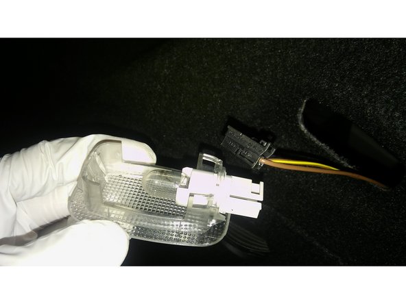 
Reinstall the new bulb (step 3 reversed).
