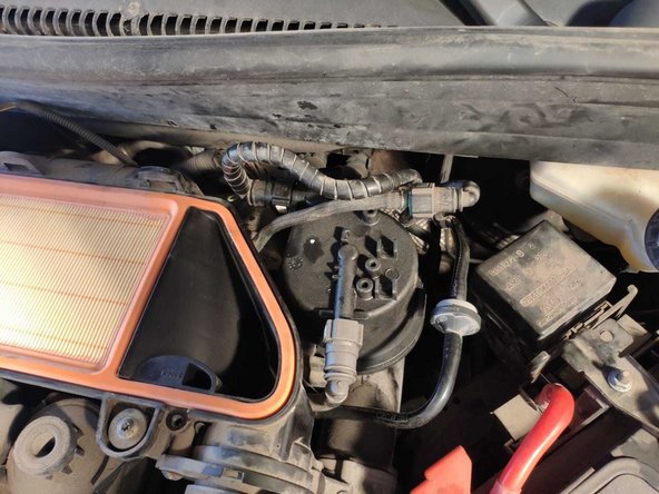 Revissez le filtre sur son support à l'aide d'une douille Torx 25