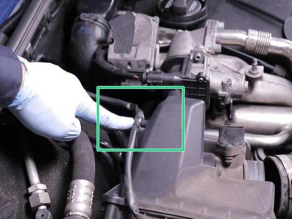 Retirer le clips du faisceau du débitmètre