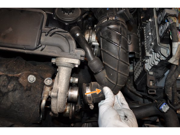 
Unhook the line and pull slightly to remove the second small air line
